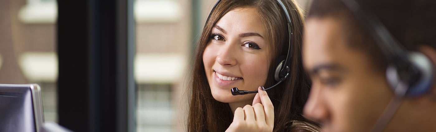 A customer service representative for Champlain Technology Group helping customers with phone and long distance internet services